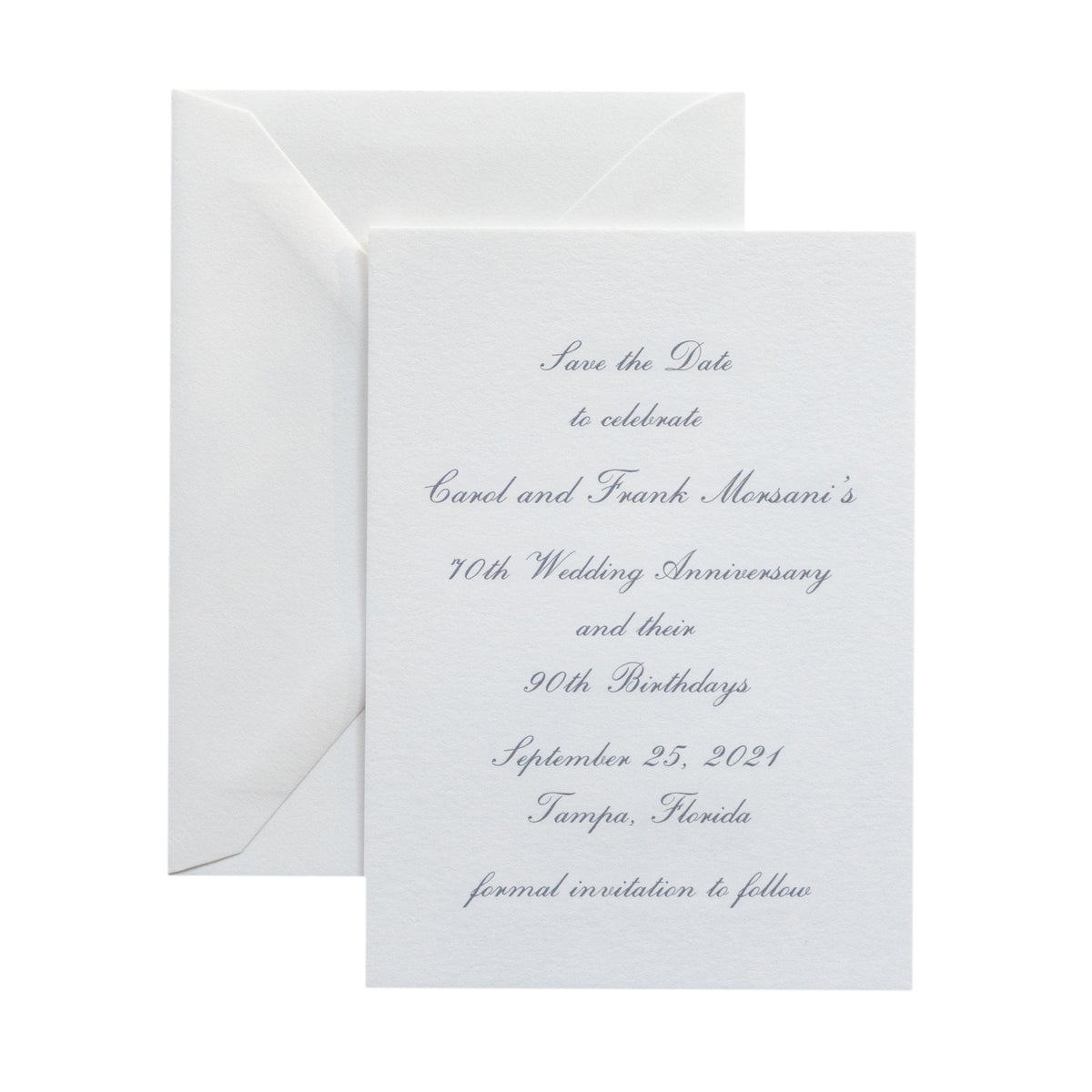 A white engraved card with elegant gray script text announces Carol and Frank Mersani’s 70th wedding anniversary and 90th birthdays celebration on September 25, 2021, in Tampa, Florida, beside a matching envelope.