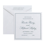 A square white letterpress card with elegant script font announces the wedding of Brooke Barry and Holland Hailey on October 1, 2022, in Atlanta, Georgia. An addressed envelope sits behind this stylish save the date.
